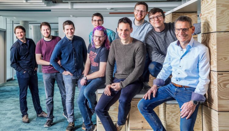 Jürgen Peters (centre), Head of Software Development at Arburg, with his Innovation Hub team in Karlsruhe. More IT and software experts are always welcome at Arburg.